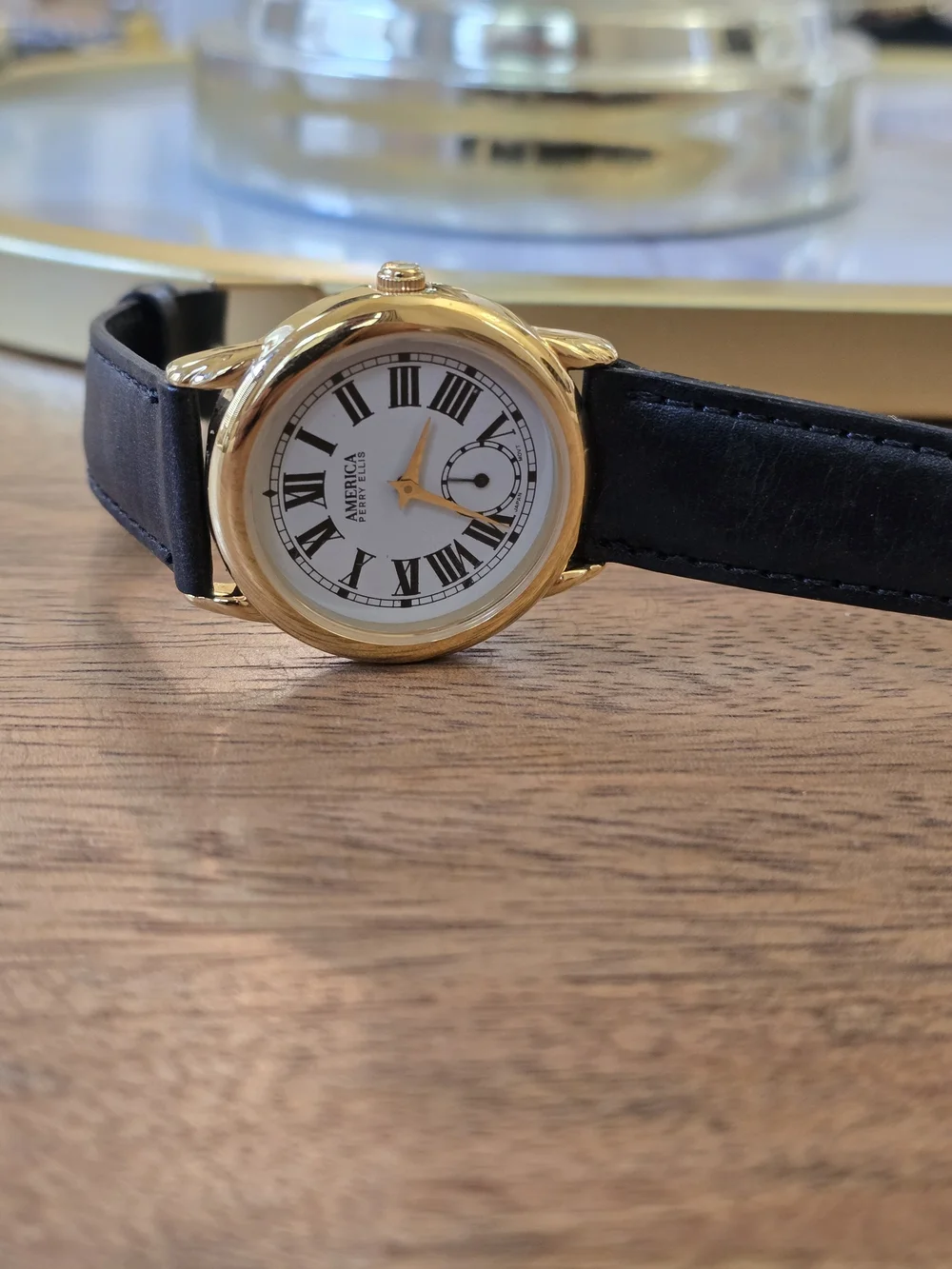 Perry Ellis Men’s Gold Case Black Leather Watch